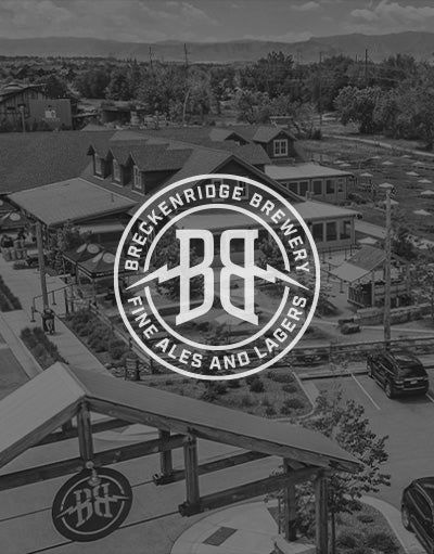 ANETIK x Breckenridge Brewery partnership logo over brewery location and outdoor patio